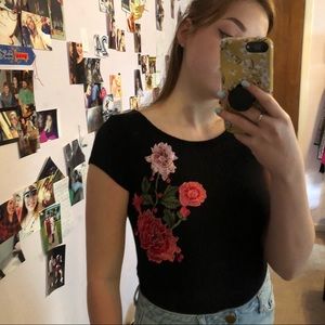 Black one piece with floral embroidery